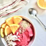 Ruby red smoothie bowl with strawberry orange beet